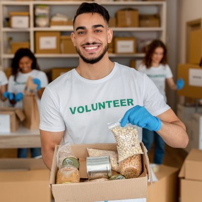 young-arab-volunteer-working-at-charity-center-ho-2021-11-04-21-38-46-utc-qcn47a15hvfjm3jp7prvufduf6zjqxx33t4u9x5vhc